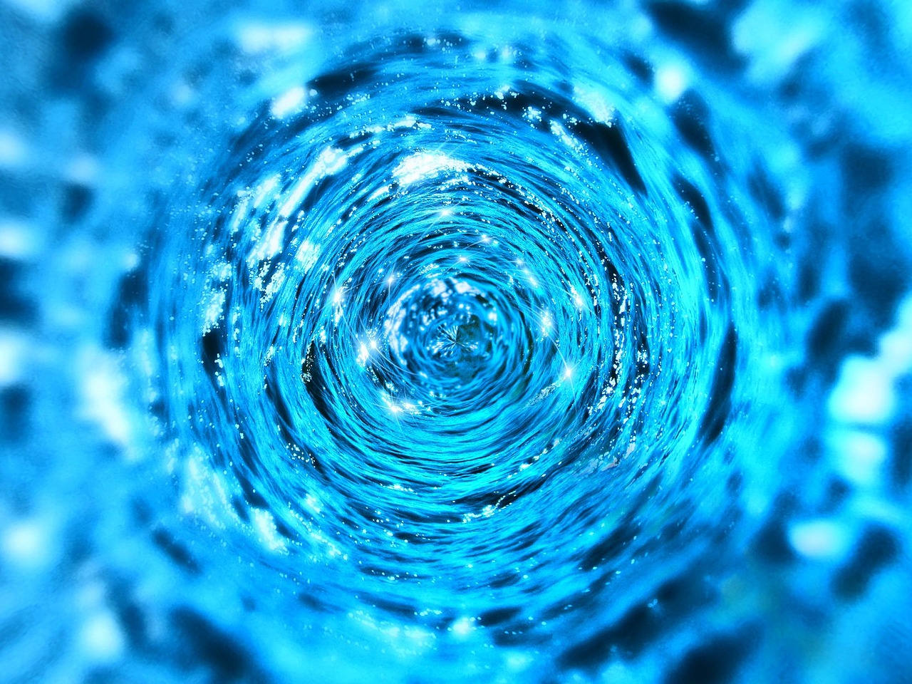 blue water with circular ripples